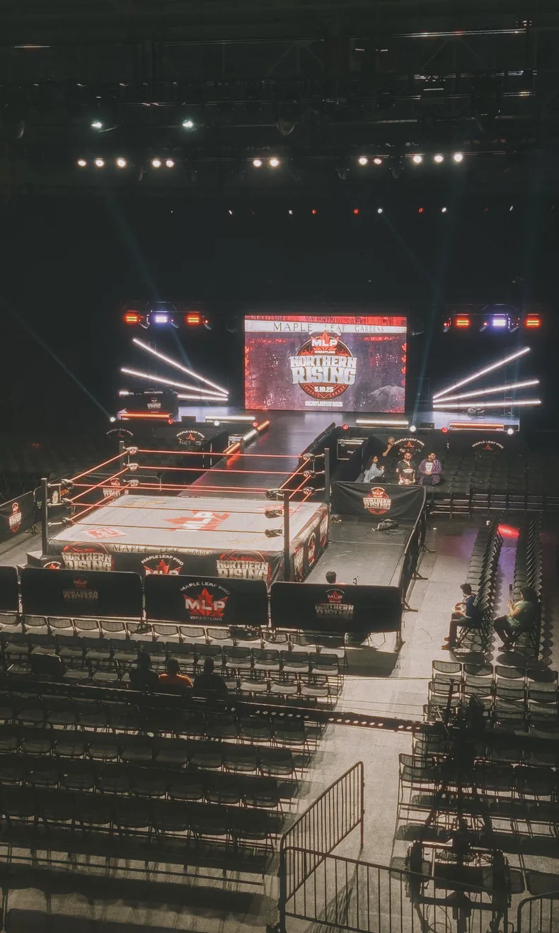 The interior of Maple Leaf Gardens before the show started, with empty seats surrounding the ring.