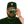 A self-portrait photograph of the author holding an SLR camera viewfinder to his eye, obsuring this face.
