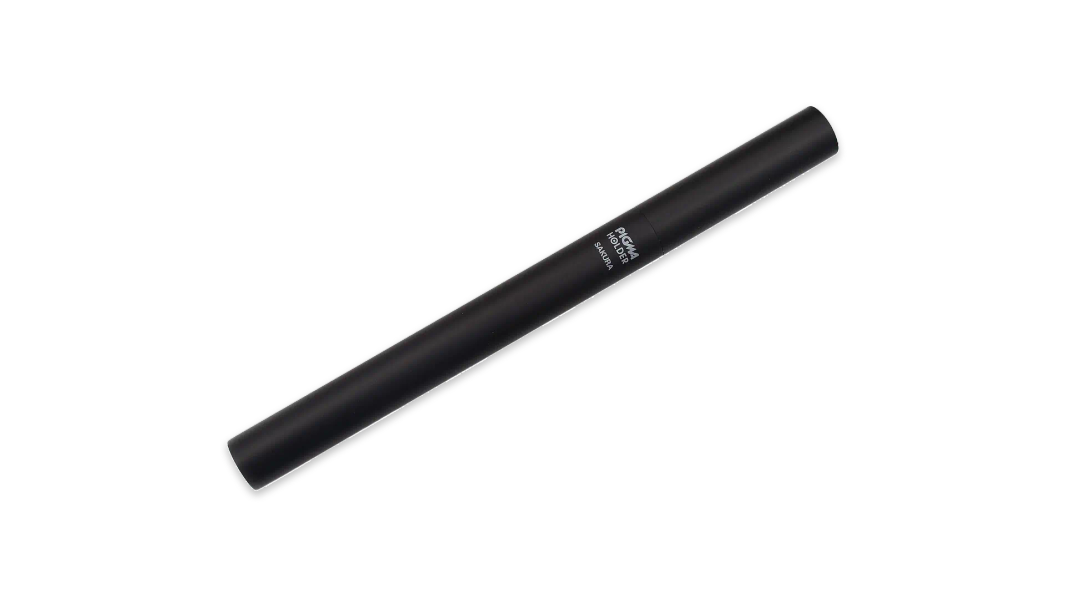 A Sakura Pigma Holder in black, a machined aluminum sheathe for fineliners.